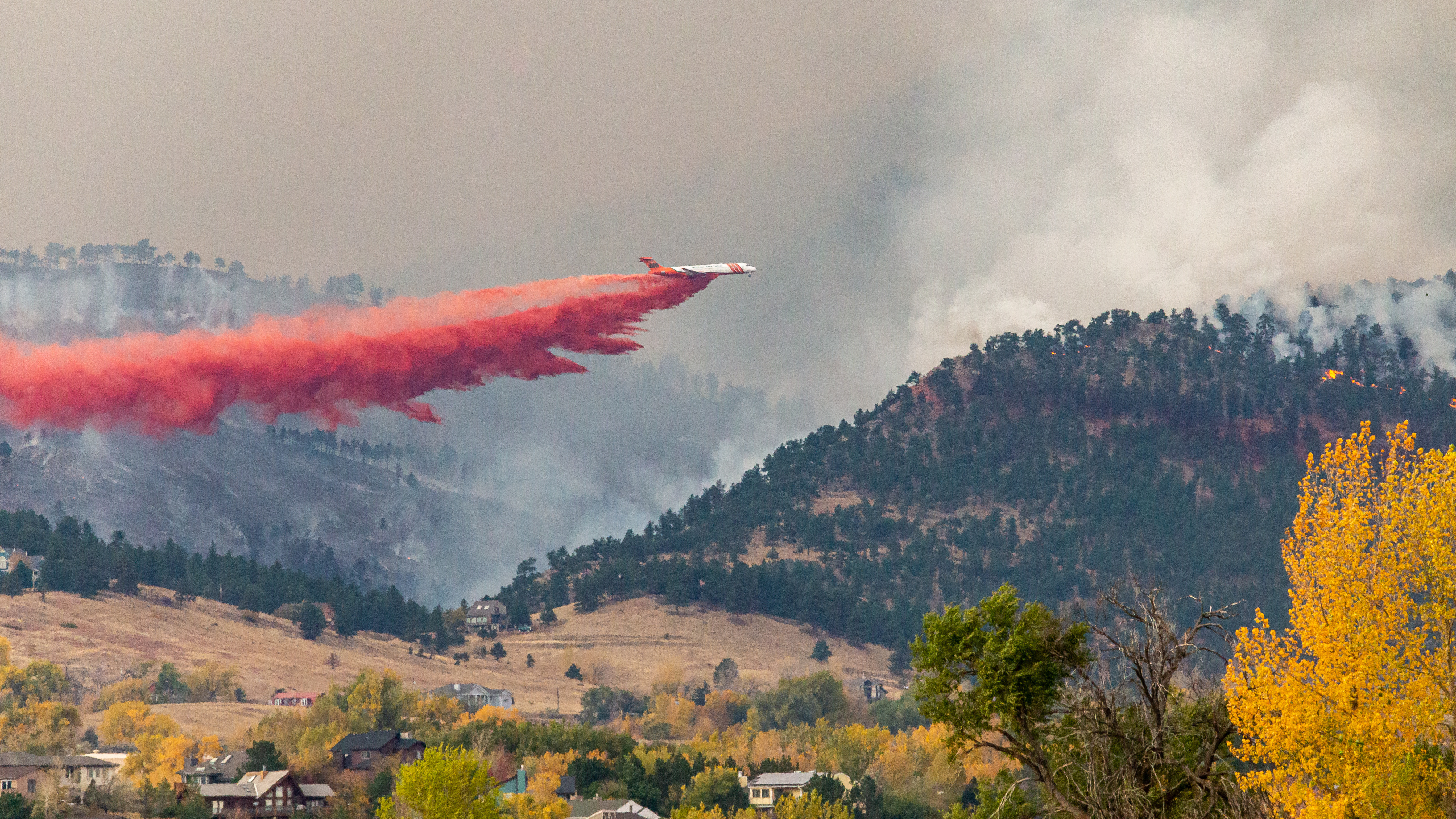 AIr tankers dropping fire retardant