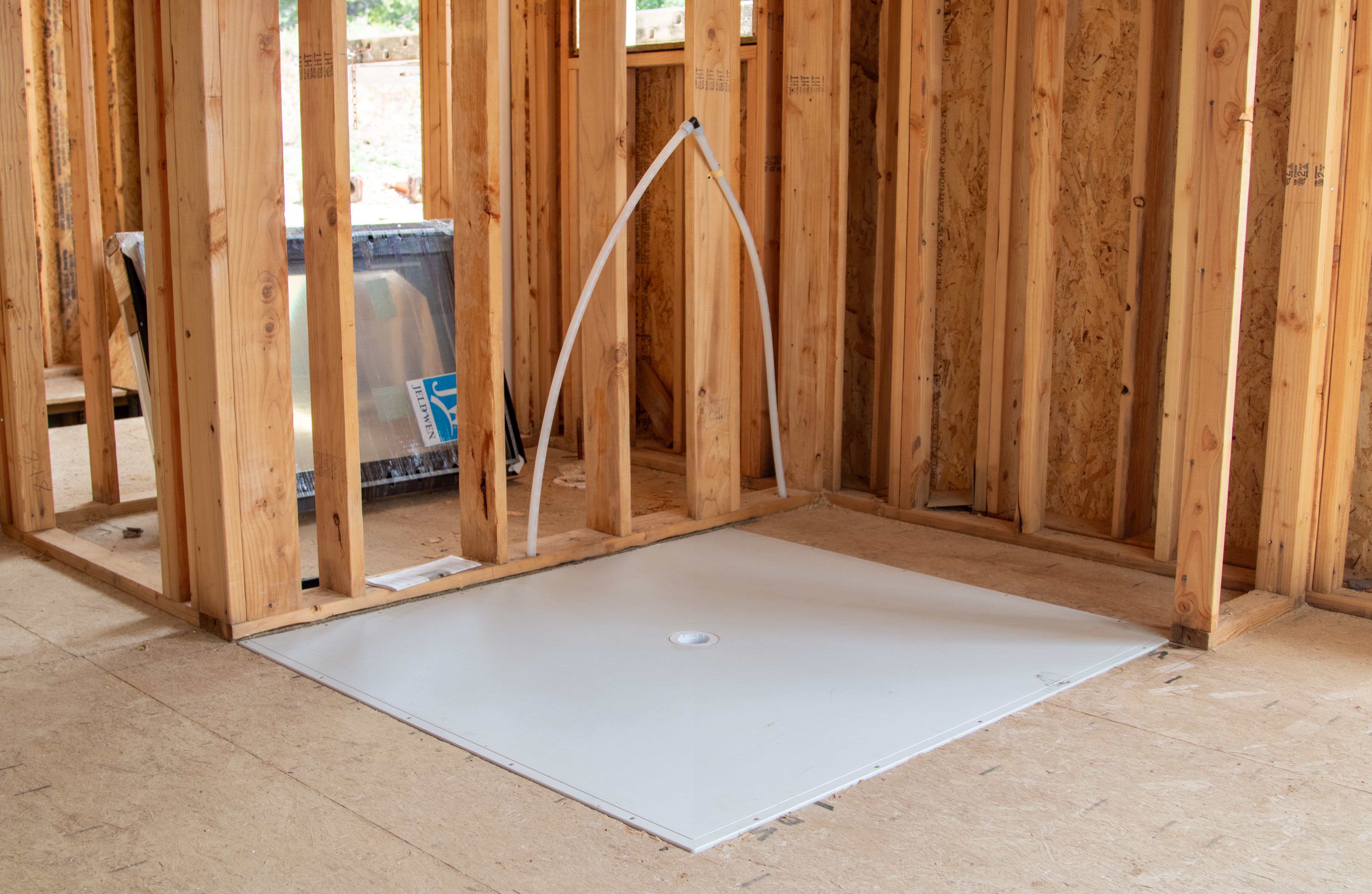 Ease of installation meets durability and protection with KurbX curbless structural shower pans. Photo courtesy of Thrive Builders.